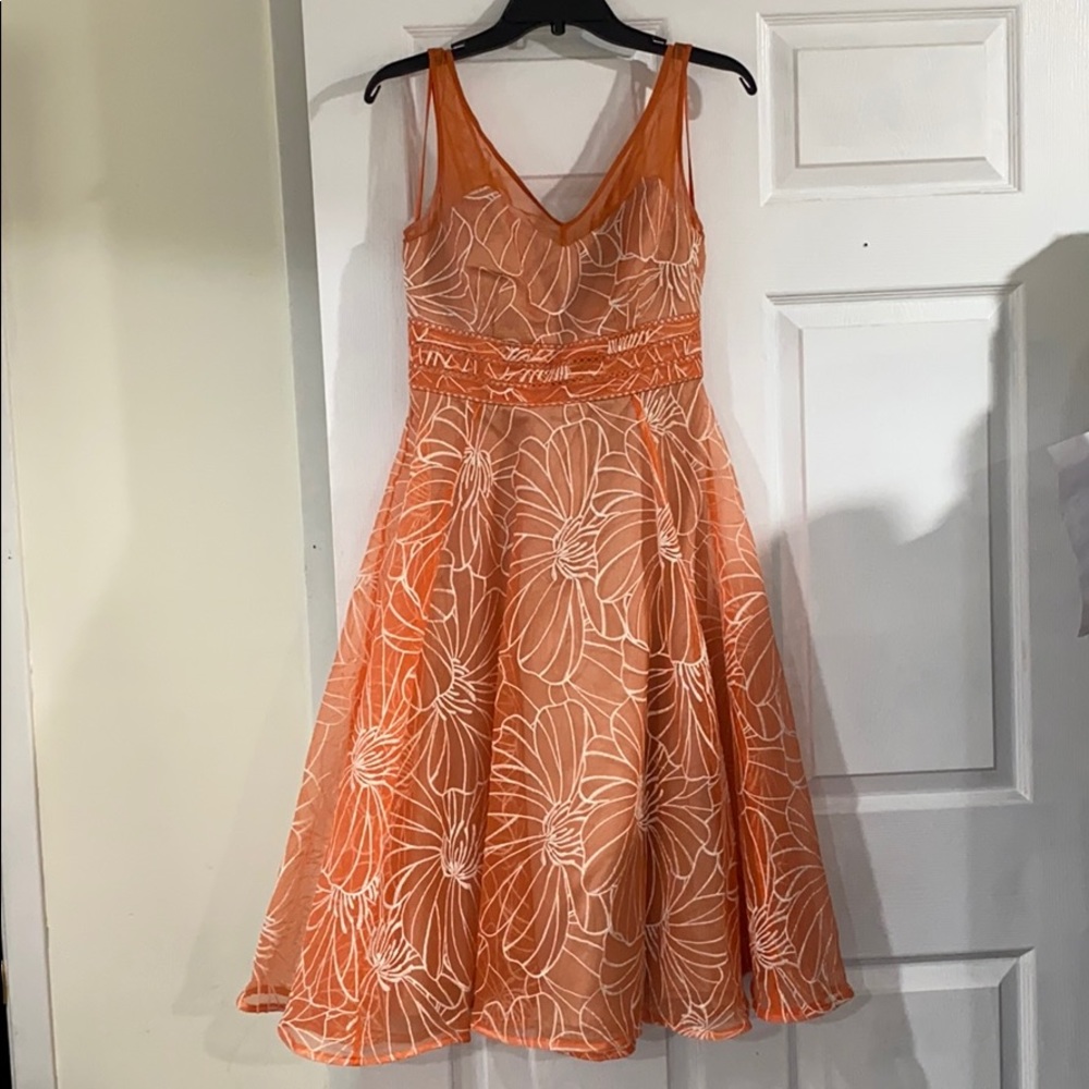 Orange overlay with white flowers dress